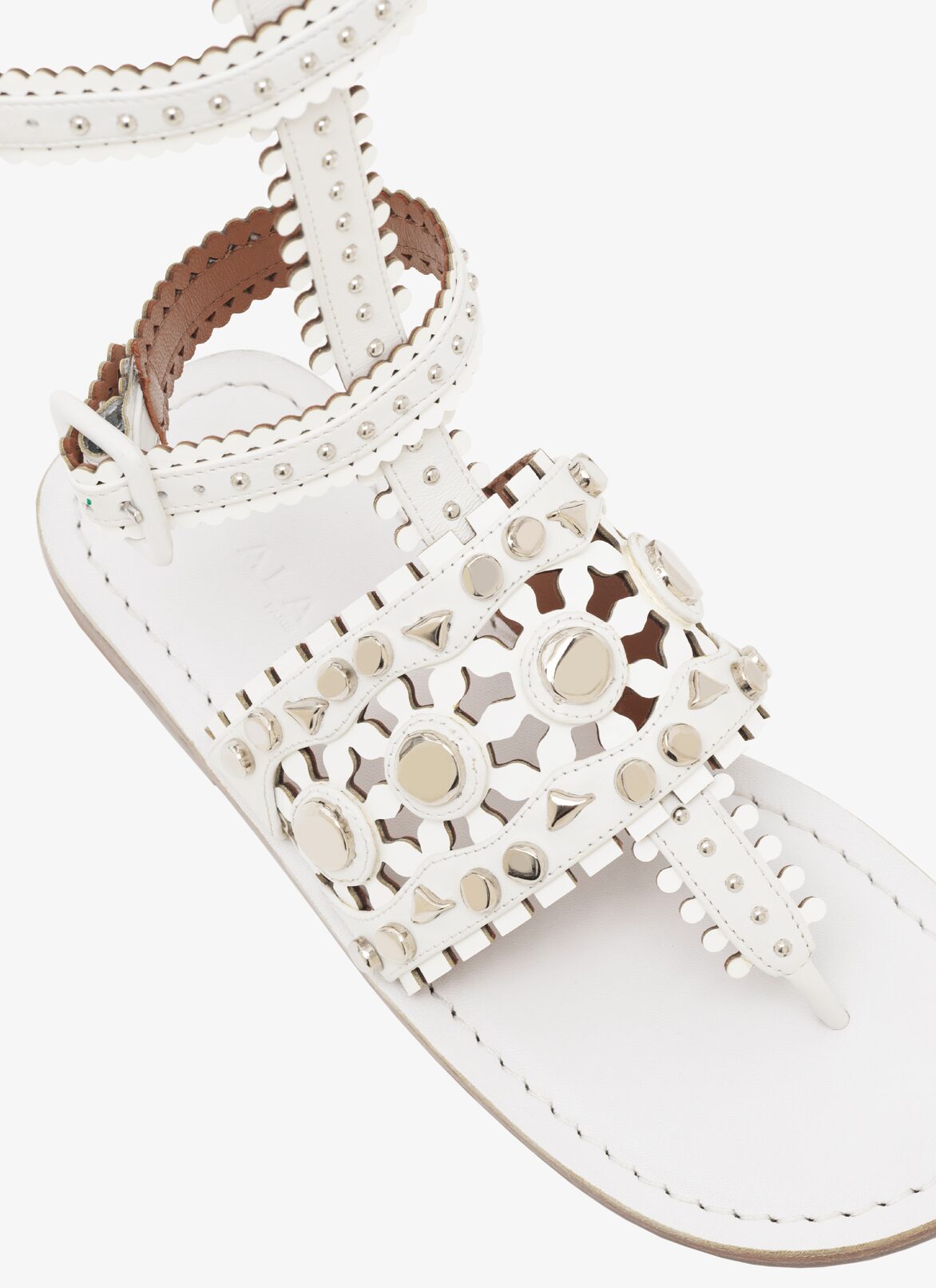 EDITION 2015 FLAT STUDDED SANDALS ALAÏA OFF-WHITE EDITION 2015 FLAT STUDDED SANDALS